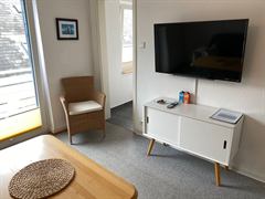 Wohnzimmer der Ferienwohnung im Obergeschoss
